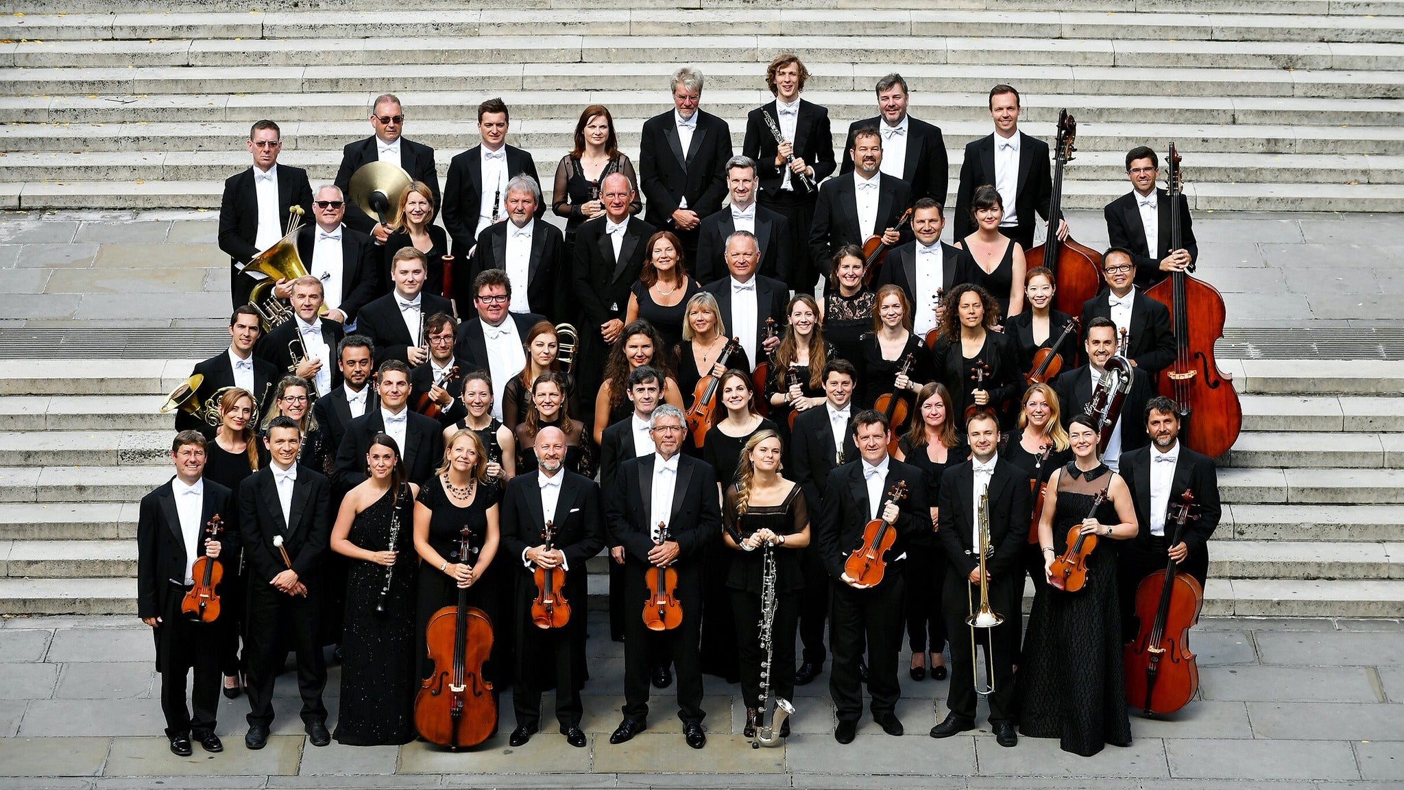 portrait of orchestra on steps